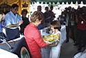 President Mireya Moscoso accepting flowers